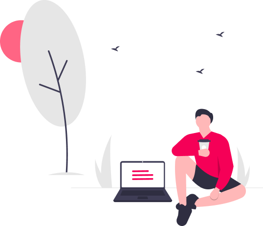 A person sitting in nature with a computer